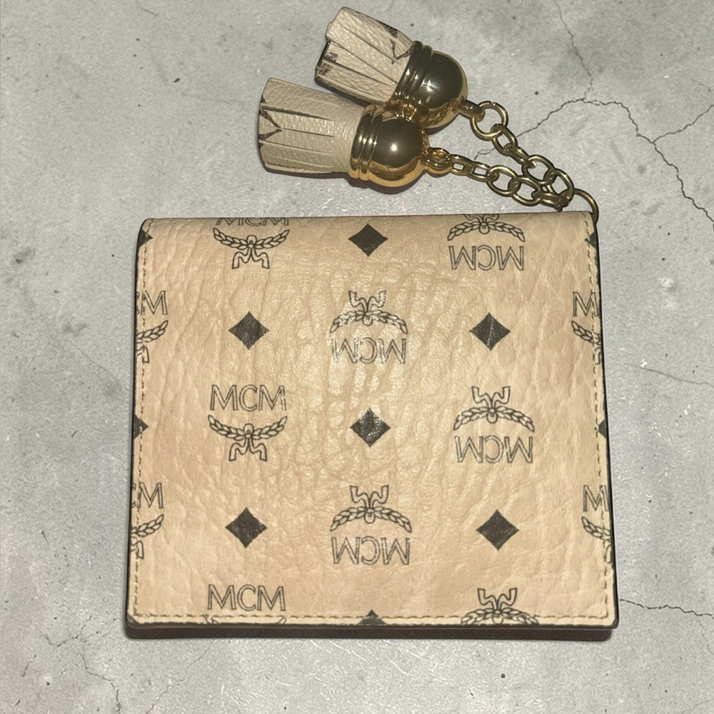 MCM Beige Monogram Tassel Compact Wallet